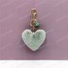 62172a6644cc4d4fd8994f71dae3cfb8.jpg Plush Fur Heart Shaped Keychain – Various Colours