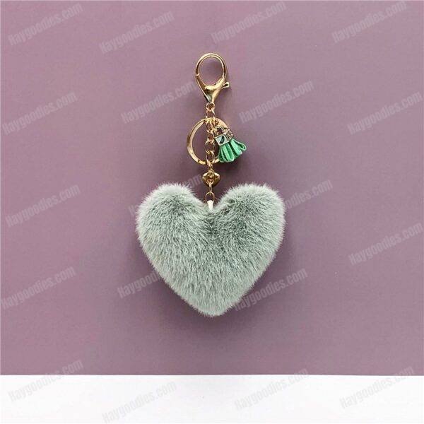 62172a6644cc4d4fd8994f71dae3cfb8.jpg Plush Fur Heart Shaped Keychain – Various Colours