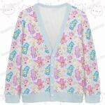Care Bears pattern cardigan pastel blue trim oversized knit sweater