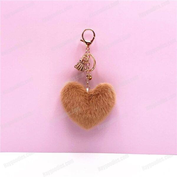 ef40958fea4c28c7017f71bb3aeed7de.jpg Plush Fur Heart Shaped Keychain – Various Colours