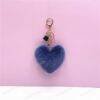 f050a34a8f770e4a4108d73d6a605635.jpg Plush Fur Heart Shaped Keychain – Various Colours