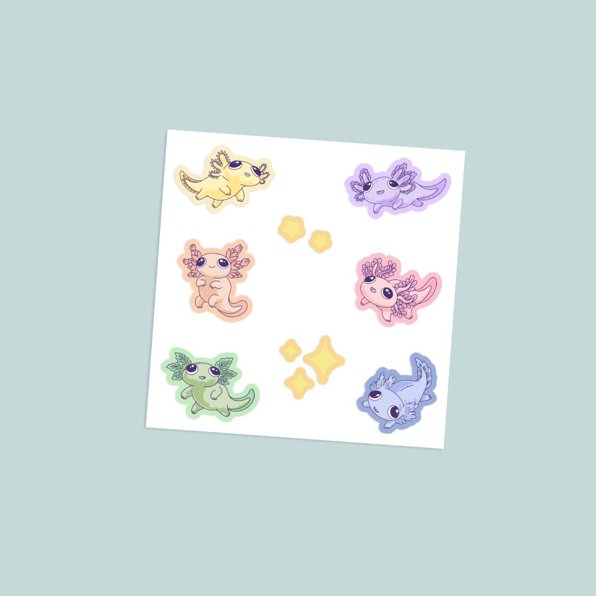 Kawaii pastel axolotl vinyl sticker sheet with six colourful axolotl characters in yellow lavender peach pink green and blue with gold star accents