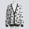 Cute black cat print unisex knit cardigan sweater front view, white with black silhouette cats, relaxed fit S-7XL