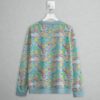 Care Bears pattern all over print women's sweatshirt in pastel blue with colourful bears rainbows sunshine and clouds all over print design