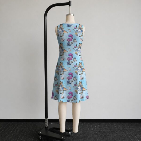 alice2-sleeveless-dress-bk2 Alice in Wonderland sleeveless dress with blue kawaii all-over print featuring Alice Cheshire Cat playing cards and Wonderland details, flowy knee length front view on mannequin