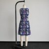 alice3-sleeveless-dress-bk2 Alice in Wonderland sleeveless dress with dark navy kawaii all-over print featuring Alice White Rabbit Cheshire Cat and Wonderland details, flowy knee length front view on mannequin