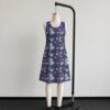 alice3-sleeveless-dress-fr2 Alice in Wonderland sleeveless dress with dark navy kawaii all-over print featuring Alice White Rabbit Cheshire Cat and Wonderland details, flowy knee length front view on mannequin