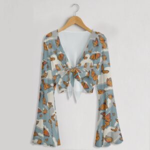 Monarch butterfly print mesh crop top with bell sleeves and tie front bow, all-over butterfly and cloud print on blue grey background, women's fit front view on hanger