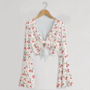 Cherry print mesh crop top with bell sleeves and tie front bow, all-over red cherry and heart print on white, women's fit front view on hanger