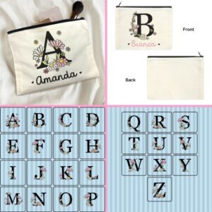 Personalised floral initial zipper pouch with letter A and name Amanda in script font surrounded by pink and white daisy print on cream canvas makeup bag