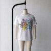 Eevee t-shirt in white with all Eeveelution group graphic including Umbreon, Espeon, Sylveon, Glaceon, Vaporeon, Jolteon and Flareon, unisex fit front view