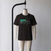 Later Gator t-shirt in black with bold retro green alligator graphic, unisex relaxed fit, front view on mannequin
