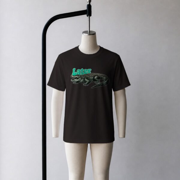 Later Gator t-shirt in black with bold retro green alligator graphic, unisex relaxed fit, front view on mannequin