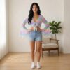pastelrainbow-mesh-top Pastel rainbow gradient mesh crop top with bell sleeves and tie front bow, soft ombre pink purple blue yellow colourway, women's fit front view