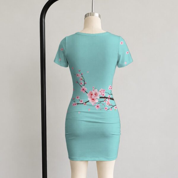 Cherry blossom bodycon dress mint green with pink floral sakura branches back view on mannequin