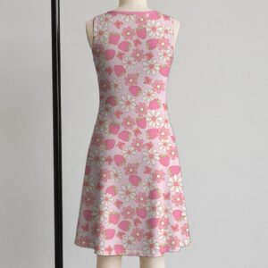 Pink strawberry daisy sleeveless dress with all-over print of strawberries daisies and butterflies on soft pink background, flowy knee length front view on mannequin
