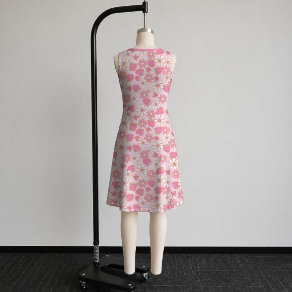 strawberry-daisy-sleeveless-dress-bk2 Pink strawberry daisy sleeveless dress with all-over print of strawberries daisies and butterflies on soft pink background, flowy knee length front view on mannequin