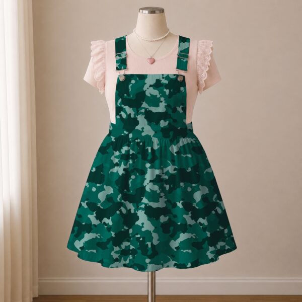 Teal green camo skirt overalls dress with adjustable straps and midi length skirt, all-over camouflage print
