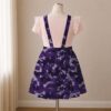 Purple camo skirt overalls dress with adjustable straps and midi length skirt, all-over camouflage print