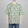 chicorita-dropsleeve-tshirt-fr Chikorita Pokemon drop shoulder t-shirt with all-over watercolour print of Chikorita on soft green and white background, unisex oversized fit
