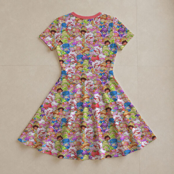 Strawberry Shortcake all-over print flowy sundress with short sleeves and pink round neck trim, retro cartoon character print