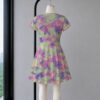 Pastel tie dye dress in pink purple and green short sleeve skater silhouette lightweight flowy