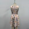 eeveeevo-girlssleevelessdres-bk girls pink sleeveless dress with Eevee evolutions print fit and flare Pokemon
