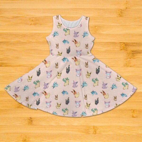 eeveeevo1-girls-sleeveless-dress-fr girls pink sleeveless dress with Eevee evolutions print fit and flare Pokemon