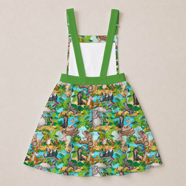 junglebook-overalls-dress-bk Jungle Book skirt overalls dress with all-over print of Mowgli Baloo Bagheera and Kaa in colourful jungle scene, green straps and waistband