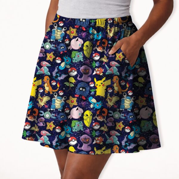 Pokemon skater skirt with all-over print of Pikachu Charmander Bulbasaur and Pokemon characters on navy galaxy background with side pockets, worn by model