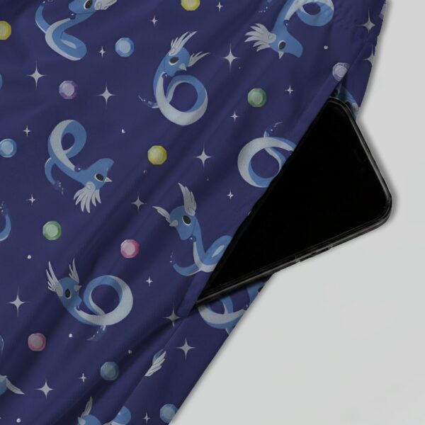 skirt-pocket-dragonair Dragonair Pokemon skater skirt with all-over print of Dragonair on deep navy background with white stars and pastel orbs, side pockets,