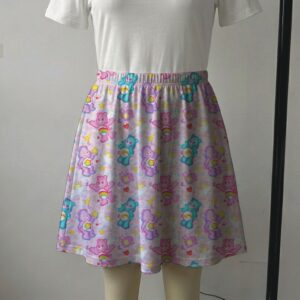 carebearspink--skirt2 Pastel pink skater skirt printed with Care Bears, rainbows, and side pockets