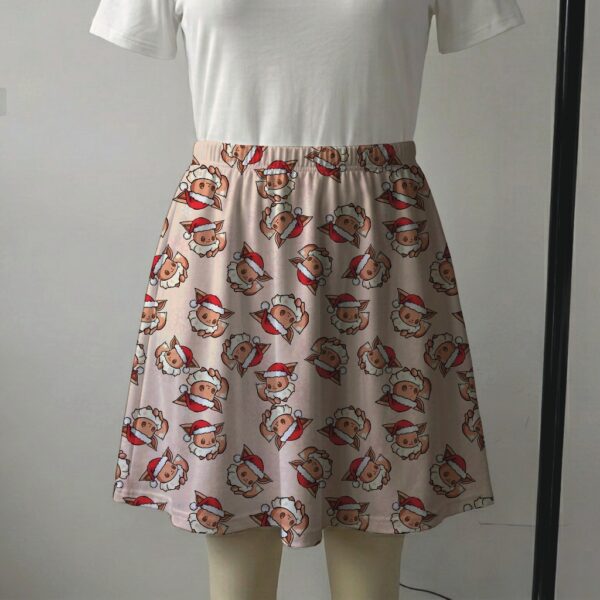 eeveexmas-skirt2 Pastel pink skater skirt printed with Christmas Eevees wearing Santa hats featuring side pockets
