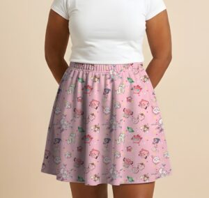 Pokemon skater skirt with all-over print of fairy type Pokemon with side pockets, worn by model