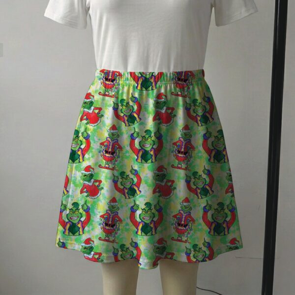 grinch-skirt2 Vibrant green skater skirt printed with Santa Grinch and featuring side pockets