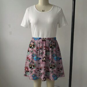 Pink holiday skater skirt with K-Pop demon hunter portraits, candy canes, and side pockets