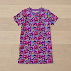 kpophuntrix-girls-tee-dress-fr Kpop Demon Hunters girls' t-shirt dress with all-over print featuring chibi-style Rumi, Zoey, and Mira characters with rainbows, microphones, and colorful accents on a purple-pink background