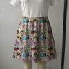 skirt-catpoke2 Cream skater skirt featuring Cat Pokemon like Meowth, Skitty, Litten, Glameow, Purrloin, Pokeballs, side pockets, and sizes S–8XL/US 4–26