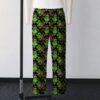 Ghostbusters Slimer skateboarding all-over print lounge pants on black background  