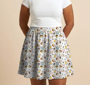 spiritedaway-skirt-fr Studio Ghibli Spirited Away skater skirt with all-over print of Chihiro No Face Haku and Soot Sprites on rich teal background with side pockets worn by model