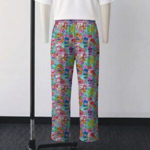 Classic Strawberry Shortcake all-over pattern lounge pants on turquoise background