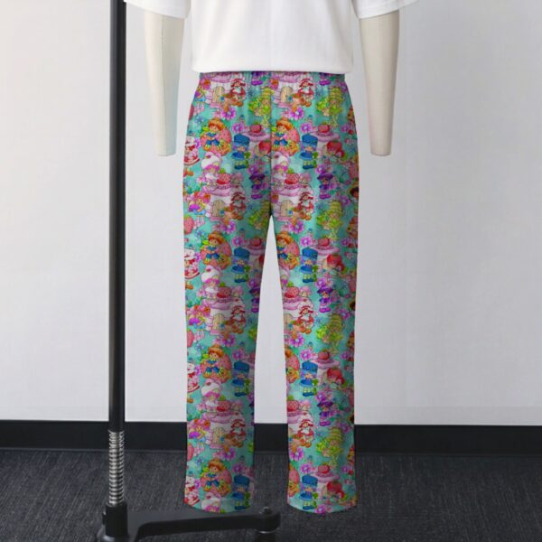 Classic Strawberry Shortcake all-over pattern lounge pants on turquoise background  