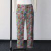 Classic Strawberry Shortcake all-over pattern lounge pants on turquoise background  